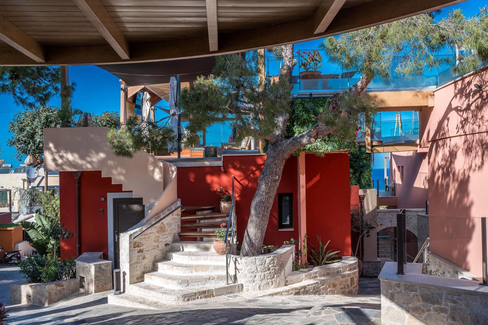 Esperides Resort Crete, The Authentic Experience Hersónissos Extérieur photo The courtyard of the house