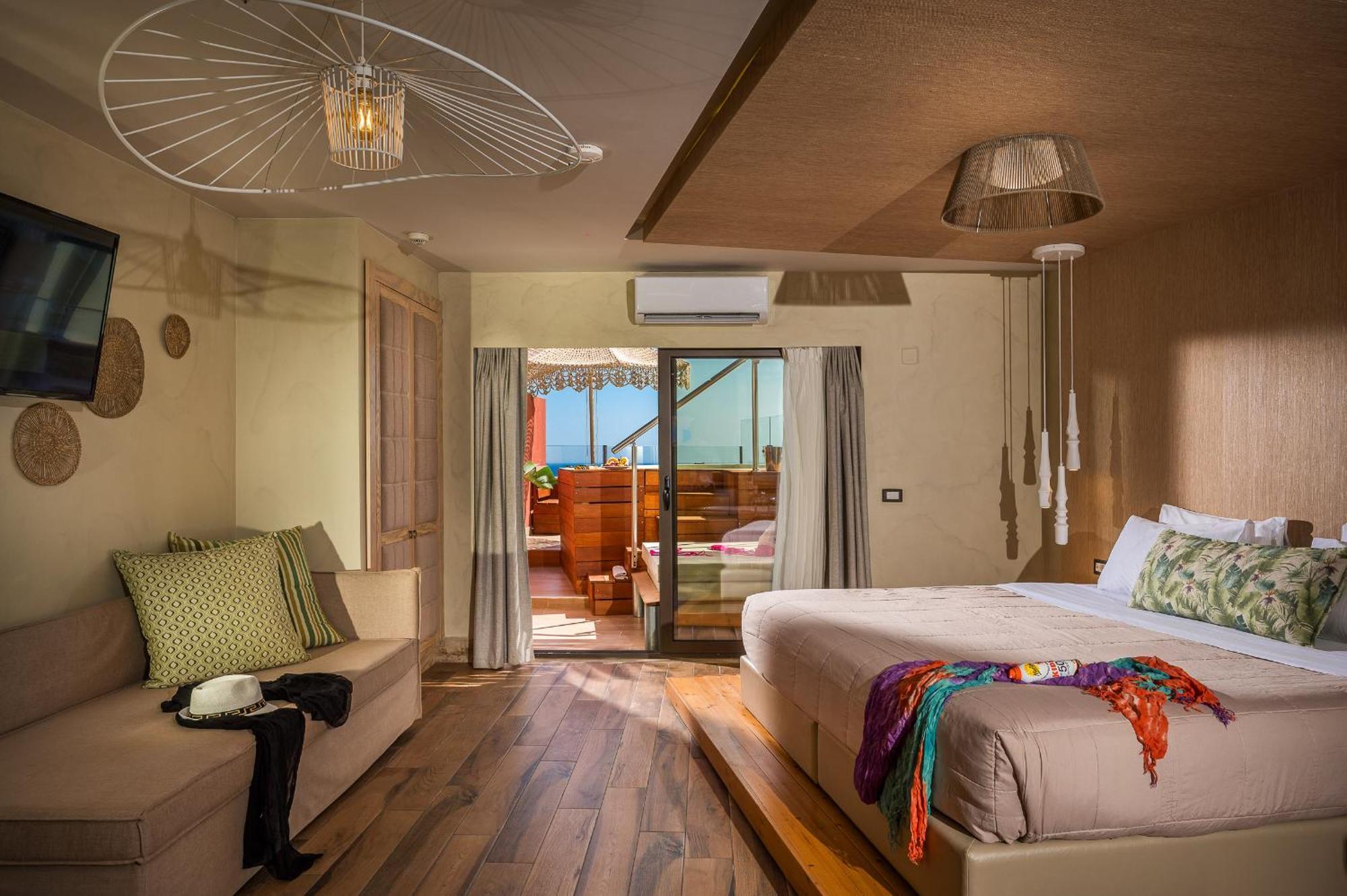 Esperides Resort Crete, The Authentic Experience Hersónissos Extérieur photo A room at the hotel
